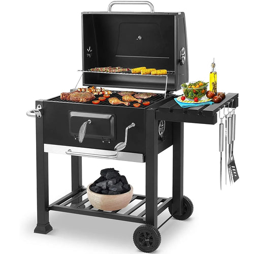 Zeleno grill na węgiel drzewny z uchwytem i składanym stołem, idealny do grillowania na świeżym powietrzu w ogrodzie.