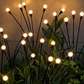 Zielone lampy solarne LED w kształcie świetlików, gruntowe, napędzane wiatrem, do dekoracji ogrodu podczas Ramadanu i festiwali